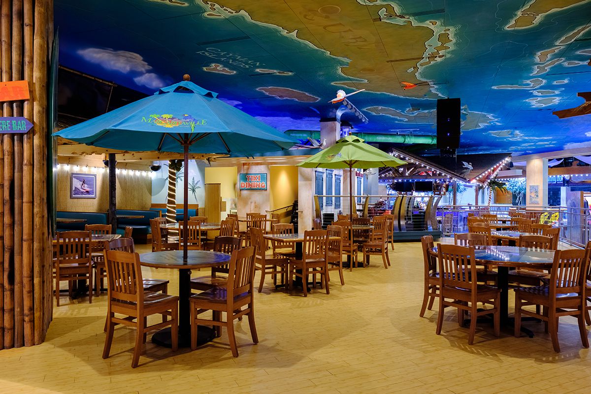 Tiki Dining Interior in blue with chairs and tables